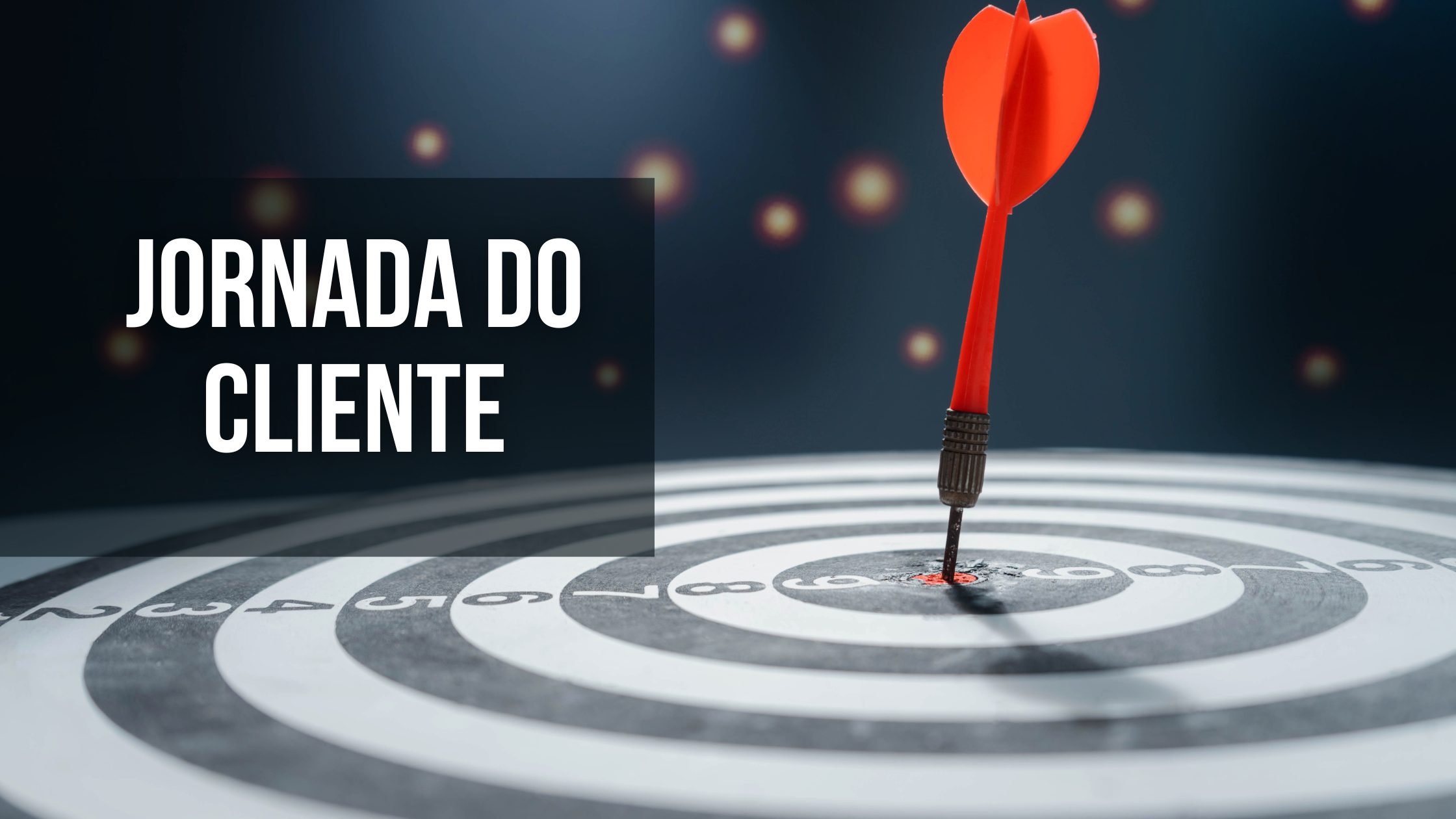um painel de mira com um dardo no meio e um texto escrito jornada do cliente.